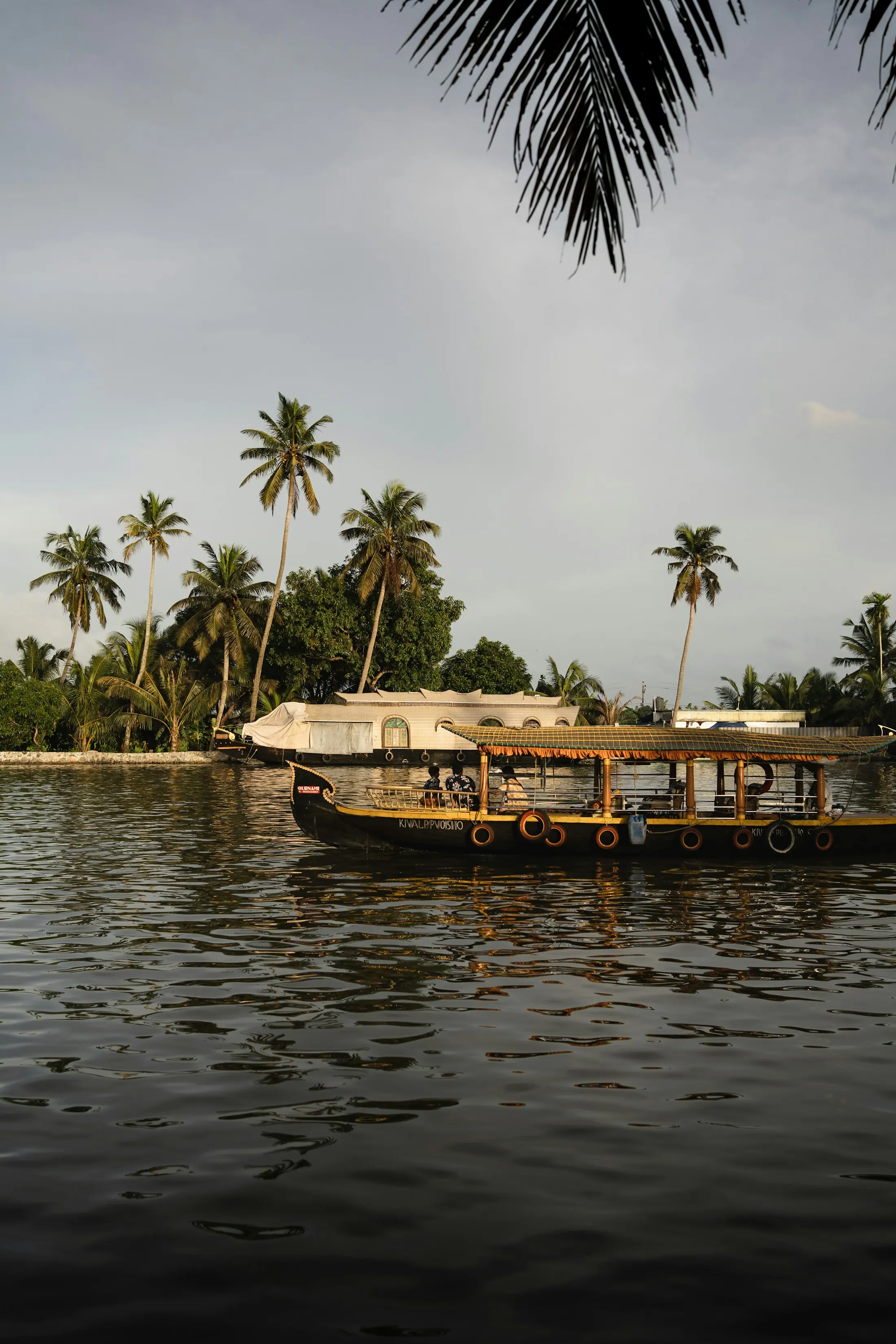 Palm-lined Kerala backwater canal for India journey planning
